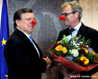 European Commission President Jose Manuel Barroso, left, receives flowers from Norway’s ambassador to the EU Atle Leikvoll, after the 2012 Nobel Peace Prize was given to the EU, at the European Commission headquarters in Brussels, on Oct. 12, 2012.