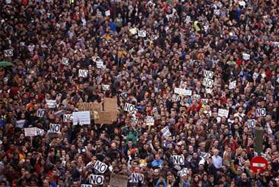 Protestors shout slogans as they fill up Neptuno Square during a demonstration against government austerity measures in Madrid, Sept. 29, 2012.