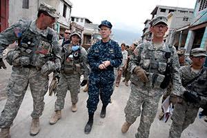 Here come the boys. They were ready to move in as soon the earthquake happened. Pure coincidence, of course.