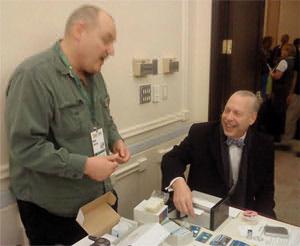 Jeffrey Tucker making a Shire Silver card with help from the company’s founder, Ron Helwig.