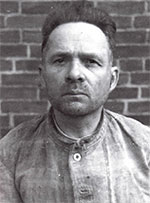 WOULD HAVE ADMITTED TO ANYTHING. Rudolf Hoess, shown above in his Nuremberg prison uniform, was the victim of vicious torture for days and nights upon end. By the time his “confession” was presented to the court, he admitted he would have confessed to anything to get the unending torture to stop.